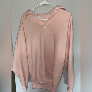 Aritzia Pink V-Neck Sweater with Relaxed Fit